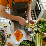 Guy preparing food at counter