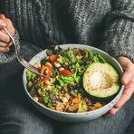 woman holding vegan food