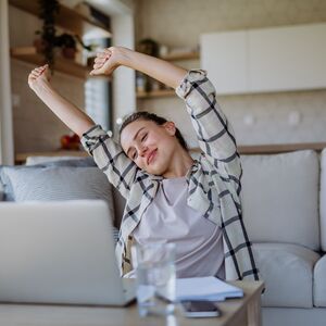 woman sitting and stretching