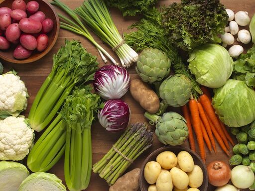 a bunch of colorful vegetables on a table