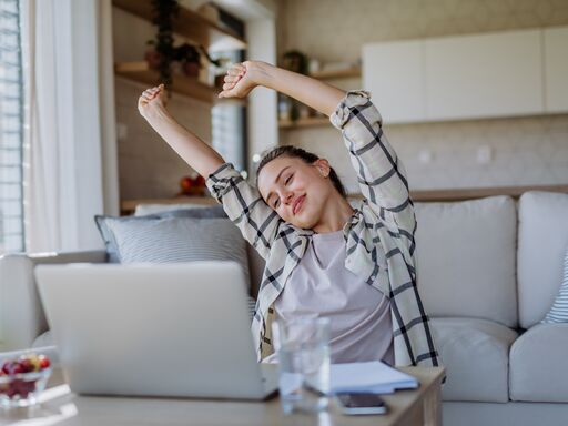 woman sitting and stretching