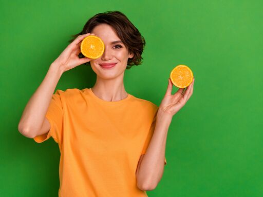woman with oranges