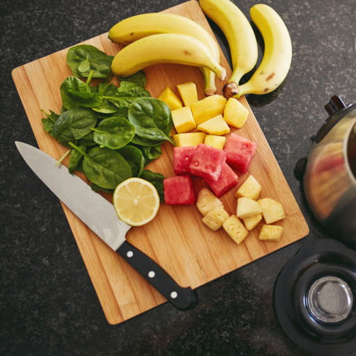 Cut Dole fruits on a chopping board